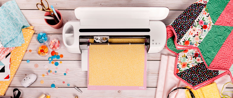 Cricut Maker with crafting supplies