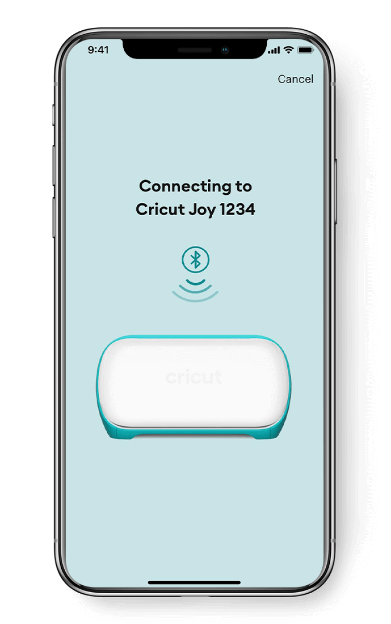 A phone showing the Cricut app connecting to the Cricut Joy