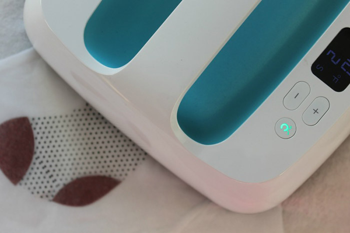 DIY Stocking Onesies Part 2 Attach your Cricut glitter iron-on