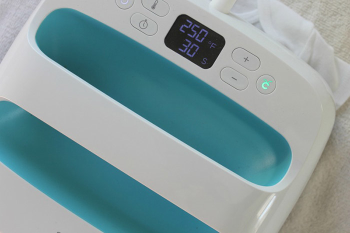 1: Apply Your Cricut Printable Iron-on to Your Onesie Attach the Cricut printable iron-on