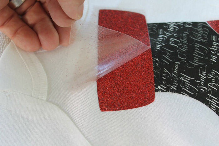 DIY Stocking Onesies Part 2 Attach your Cricut glitter iron-on
