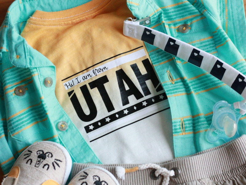 Customizing Baby Items with Cricut Iron-on Finished onesie