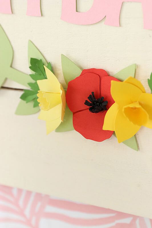 Easy DIY Baby Shower Decor With a Cricut Rose Machine Close up of paper flowers made with a Cricut rose machine