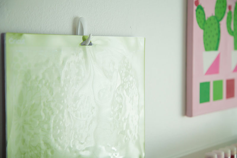 Organize Your Craft Room This Fall! Use a Command hook to hang your mats