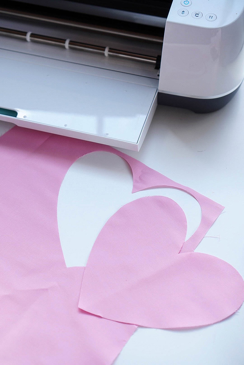 DIY No-Sew Valentine’s Day Wall Hanging Cut out the accents for your fabric banner