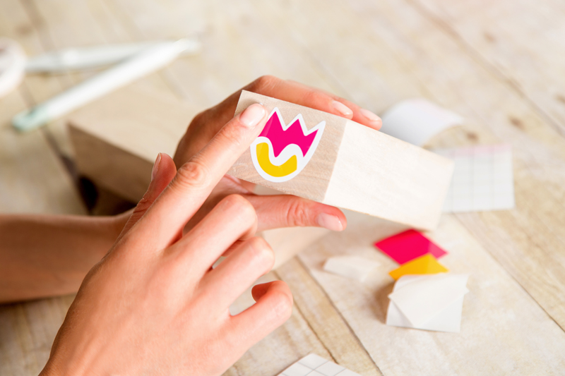 4: Transfer the Vinyl Flowers Transfer the vinyl flowers for the tumbling towers game