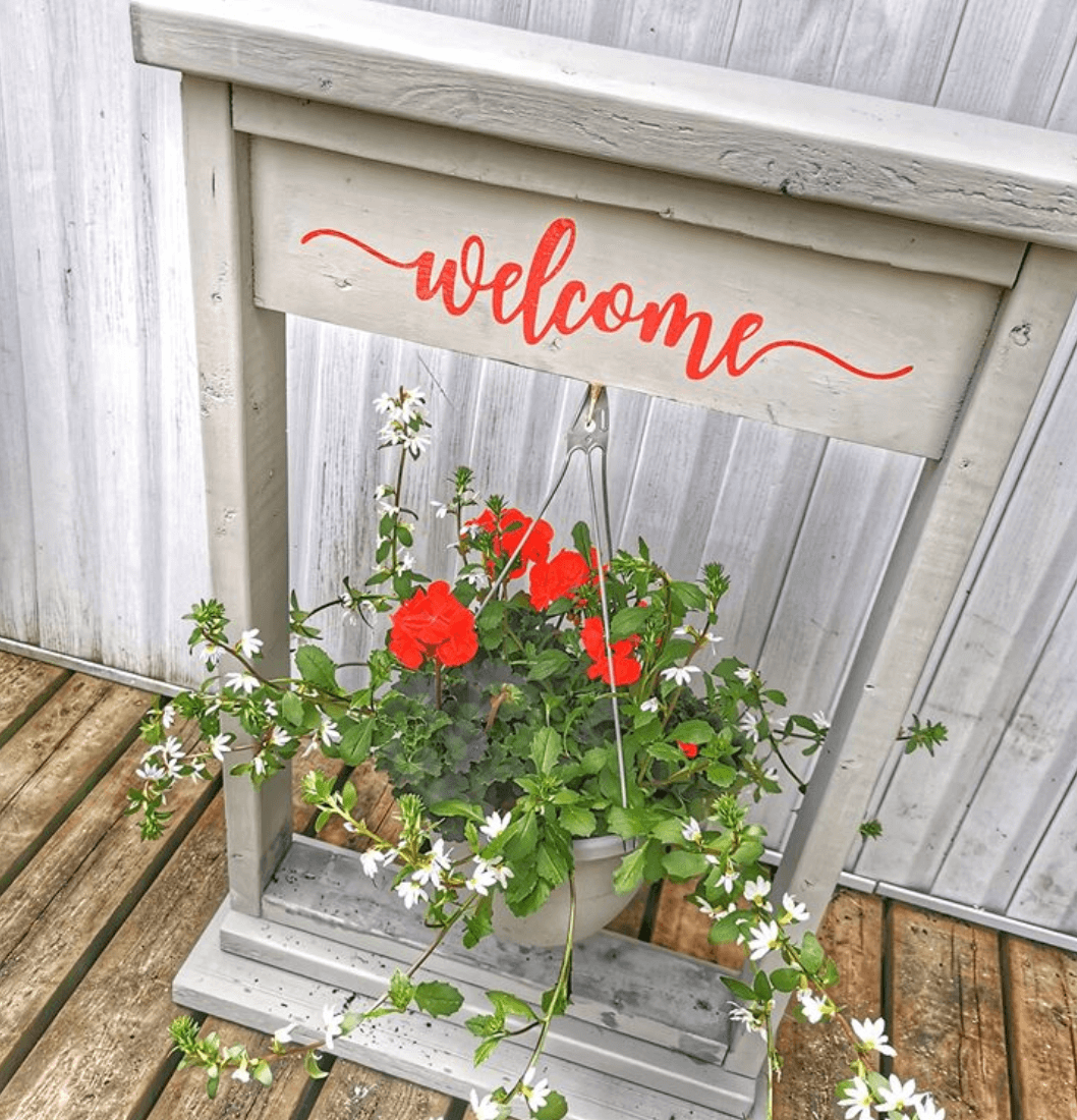Plant hanger with decal